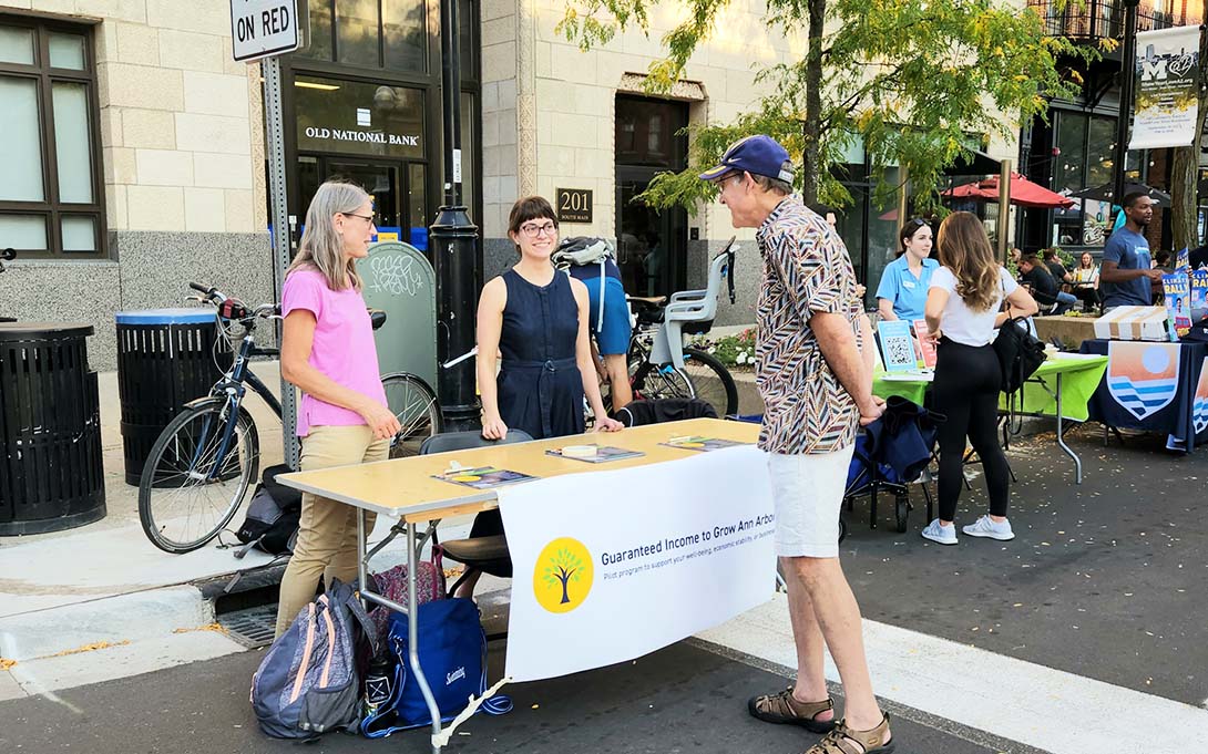Seefeldt and Emily Shupp Parker (MSW ‘24) speak with Ann Arbor residents about GIG A2