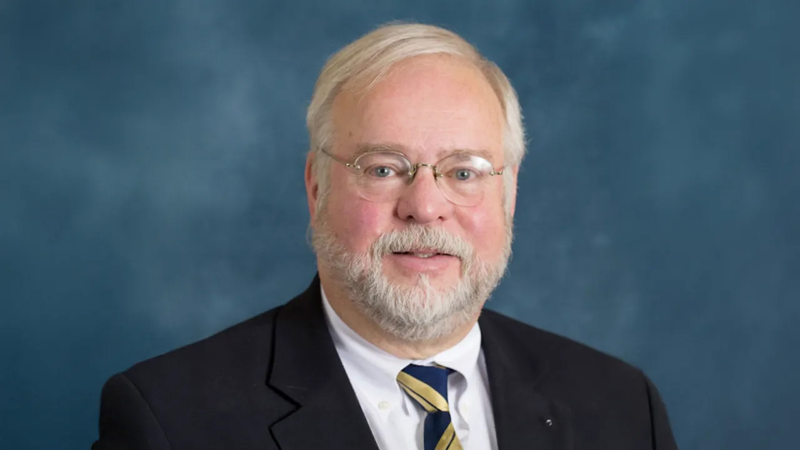 Portrait photograph of Tim Johnson.
