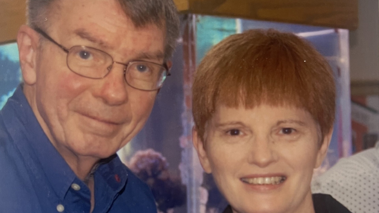 Lee Feldkamp and Rose O'Connor smiling and standing affectionately together.