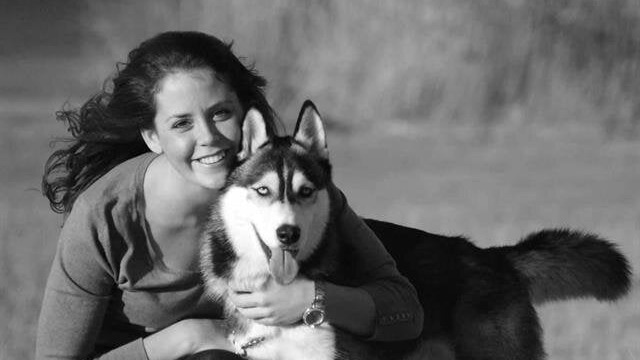 Bethany Burns and her dog posing