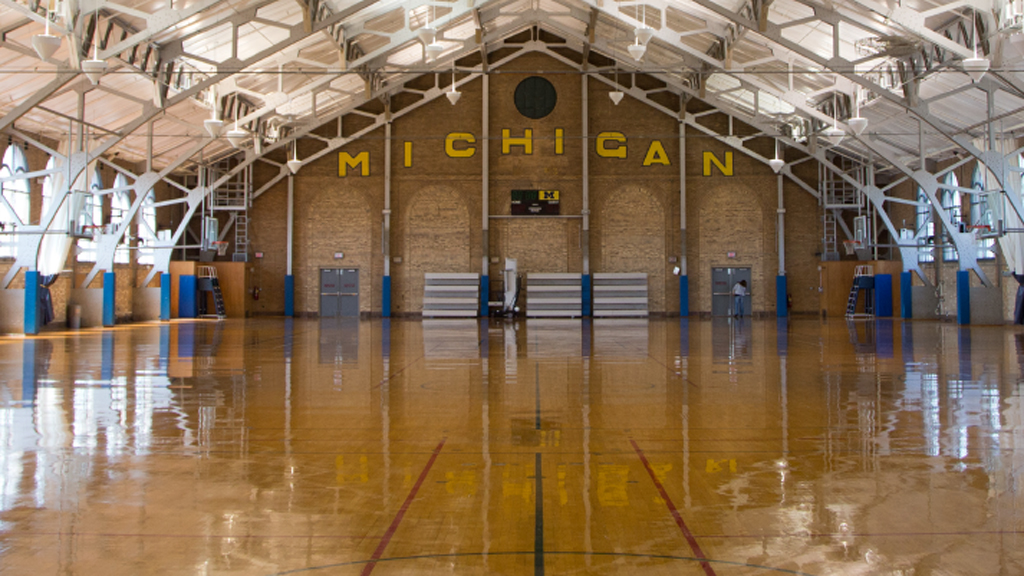 An empty Michigan gymnasium.