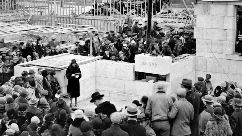 A large crowd of people gathered to watch the laying of the cornerstone for the Michigan League building.