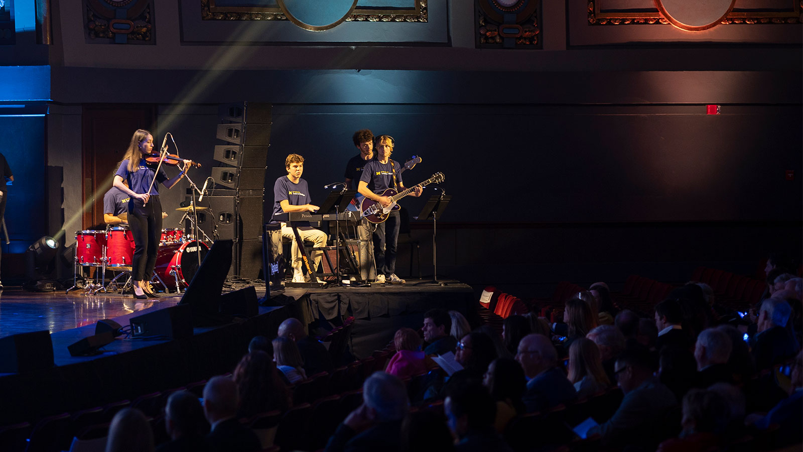 A crowd watching student musicians perform at Hill Auditorium.