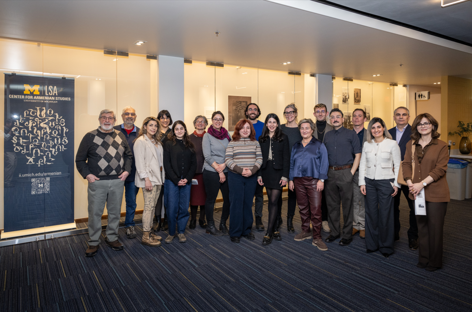 A group of students and faculty pose at the Center for Armenian Studies