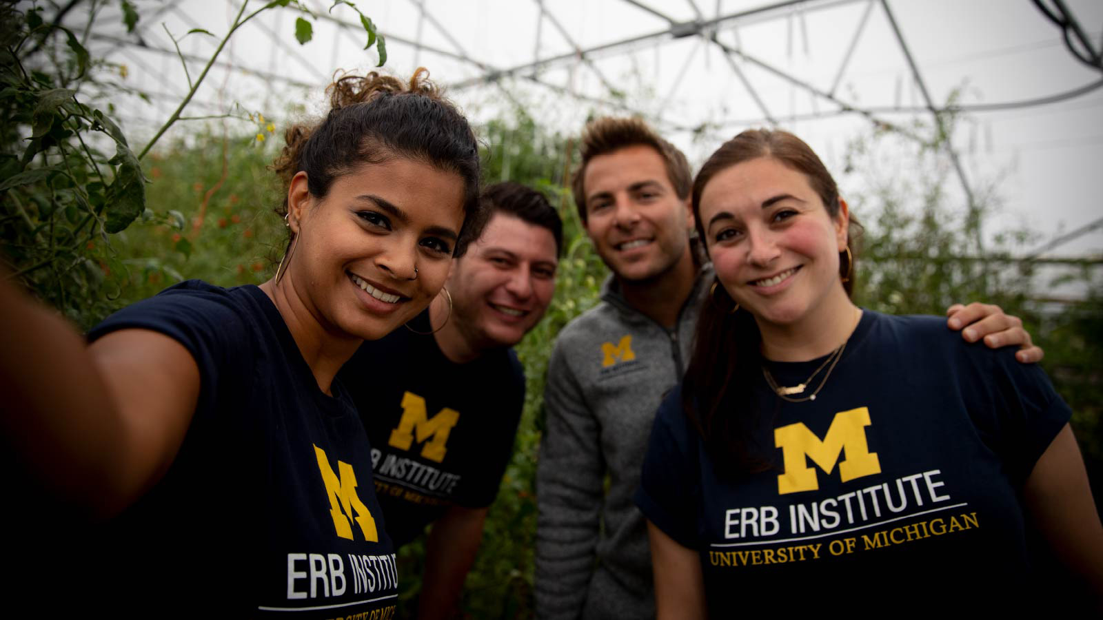 Students wearing t-shirts that say M Erb Institute, University of Michigan