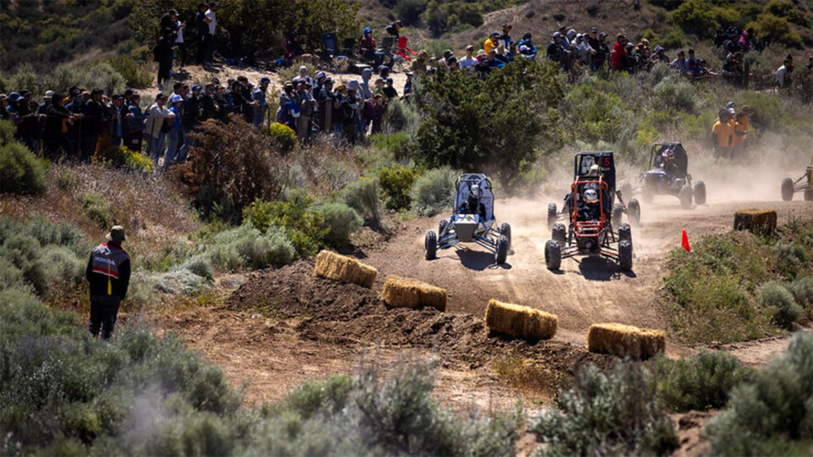 University of Michigan Baja vehicle (#69) participates in the four hour endurance race during the BajaSAE International Competition at the Hungry Valley State Vehicular Recreation Area near Gorman, California. 