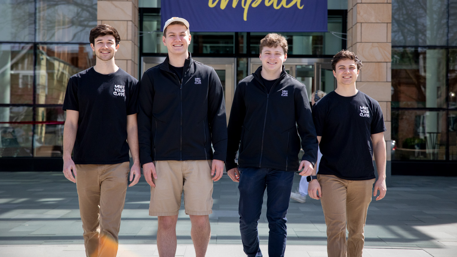 A photo of MeetYourClass founders Jon Millar, Blake Mischley, Jonah Liss, and Kaleb Schmottlach outside of Michigan Ross.