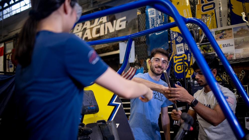 U-M students working on the Baja Racing project.