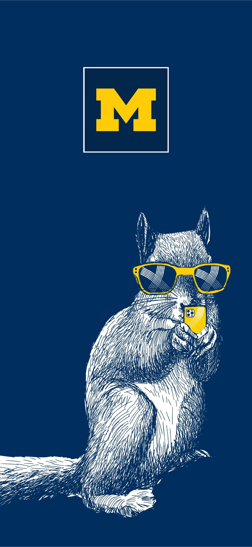 An illustration of a squirrel in sunglasses holding a smartphone. Above the squirrel is the University of Michigan block M.