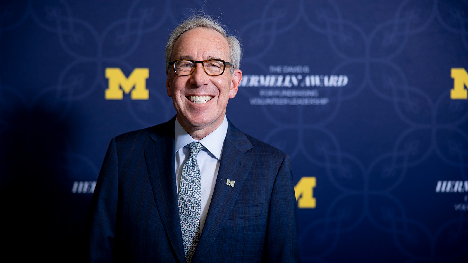 Mark Gerstein in front of a Hermelin Awards backdrop.