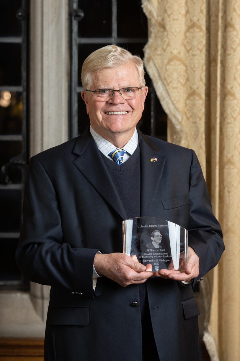 Bill Hall holding his Hermelin Award.