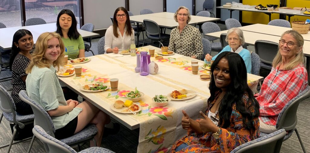 Molly Dobson enjoying lunch with Dobson interns and D-SIP leadership and committee members in 2022.