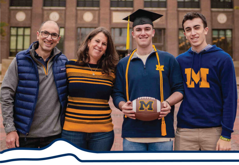 The Ehrenberg family posing together on the Diag.