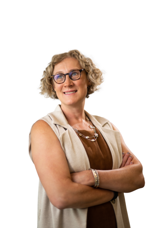 Dr. Cunningham standing with her arms folded.