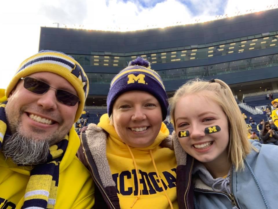 Sara Theriot at a U‑M football game.