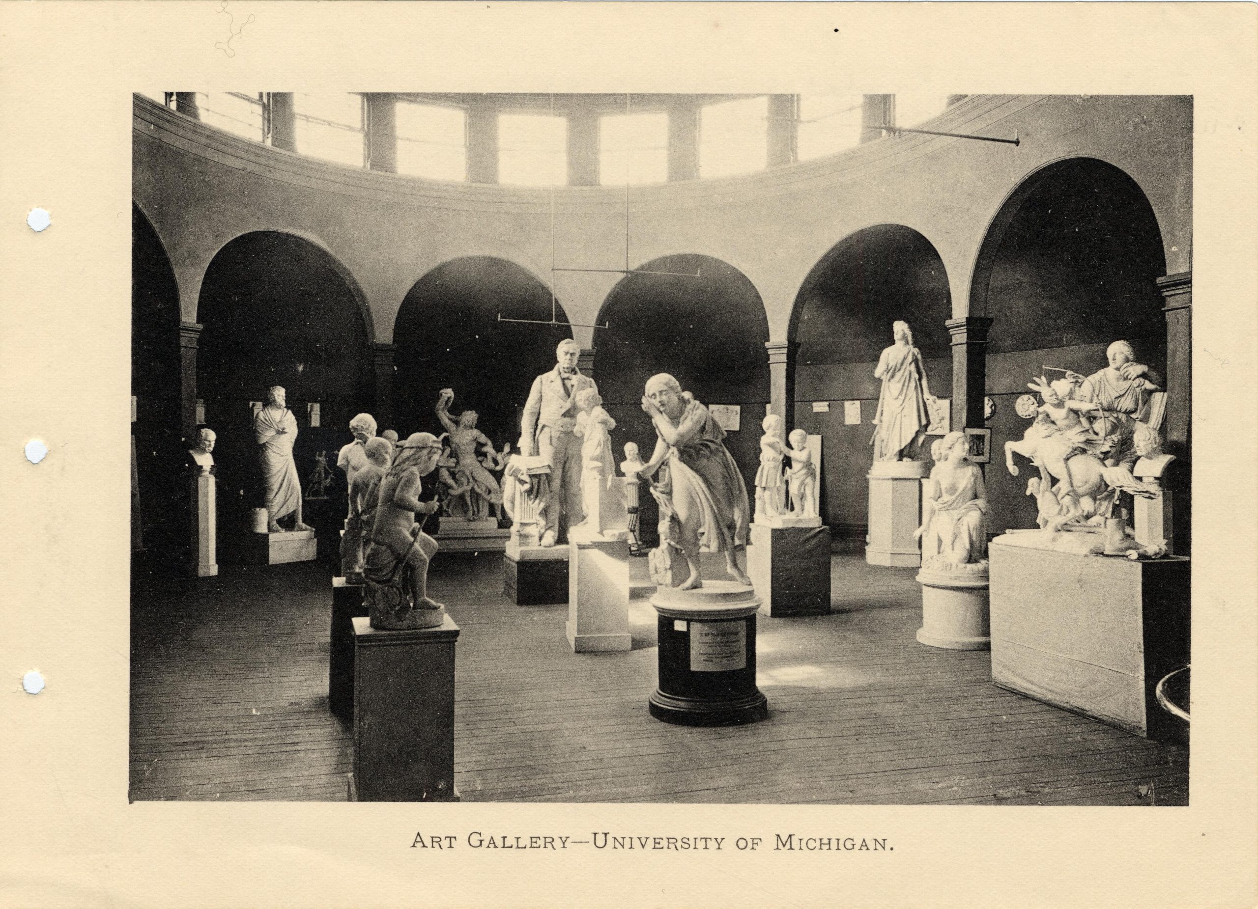 An old image of statues within the Art Gallery at U‑M.