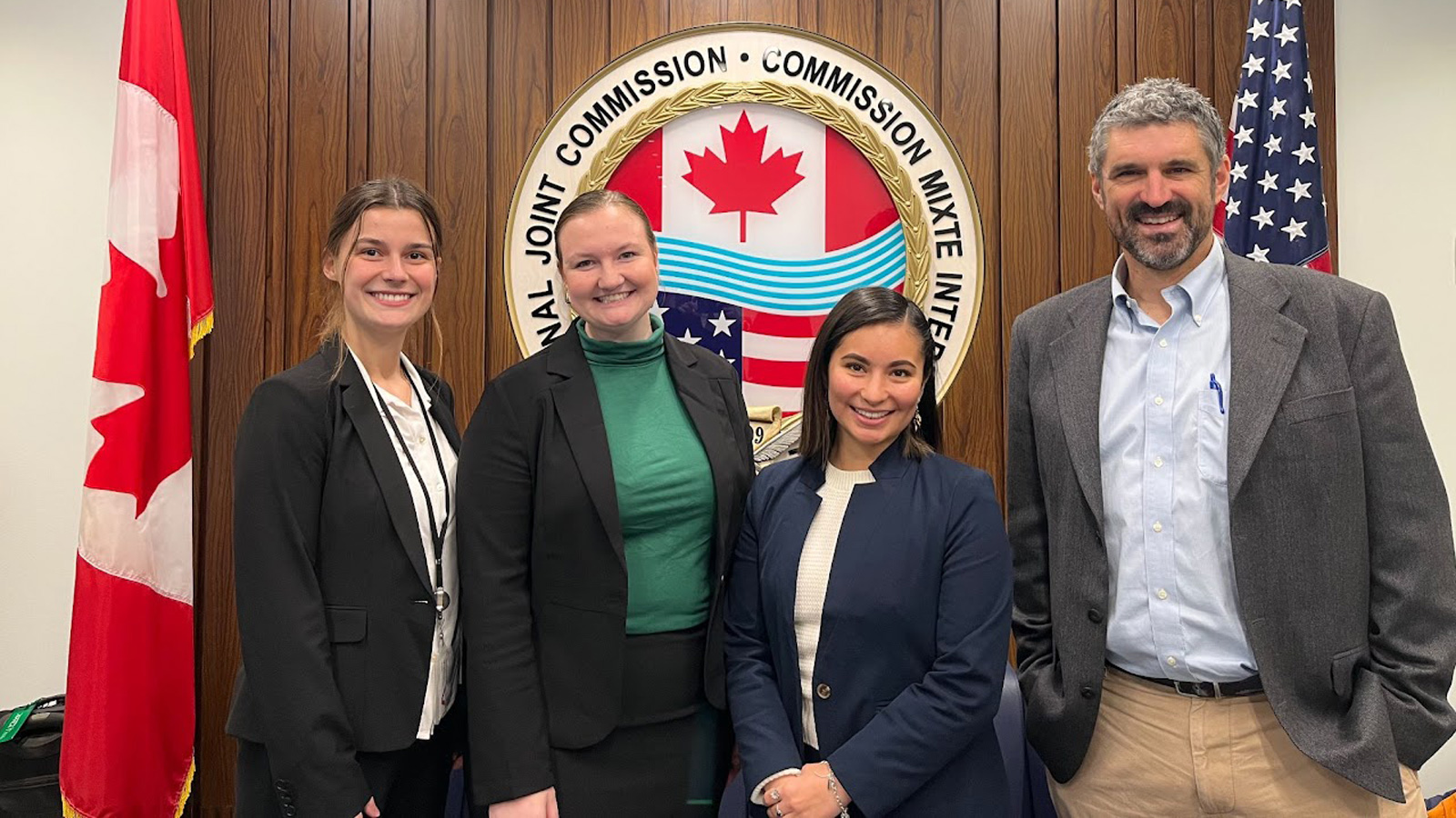 Professor Drew Gronewold alongside other lab members attending the International Joint Commission bi-annual meeting in Ottawa, Ontario.