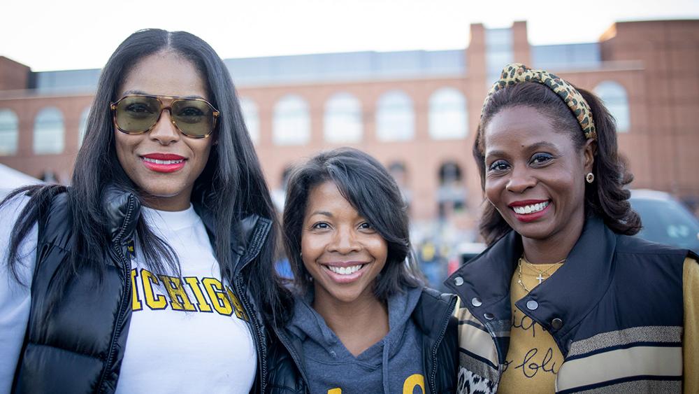 Brandi Hudson and guests at a Raise tailgate celebration.