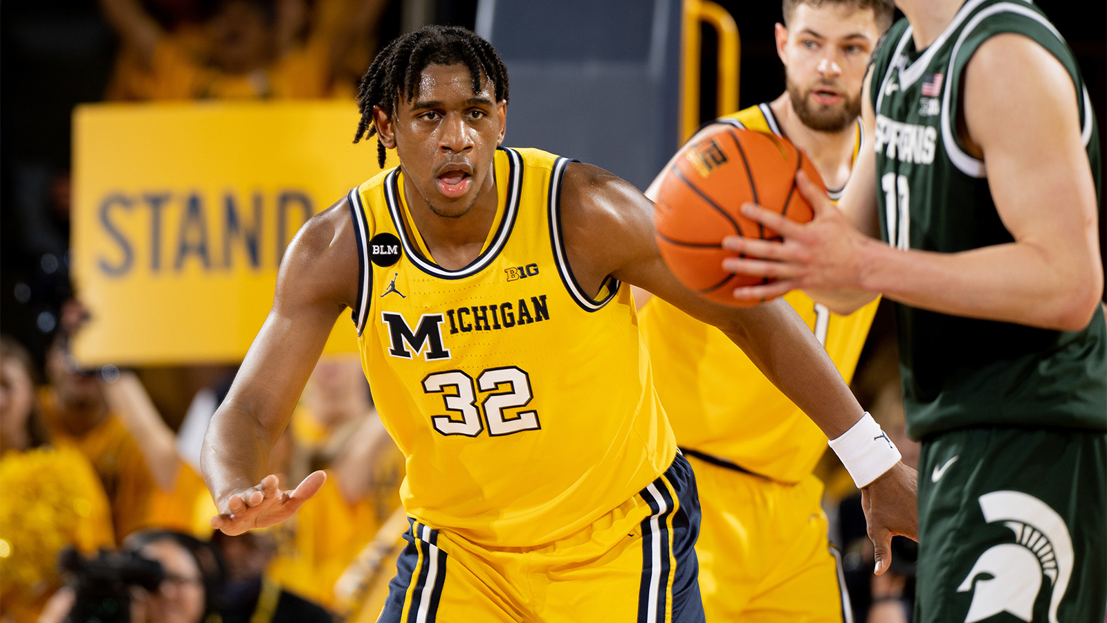 Tarris Reed playing basketball. 