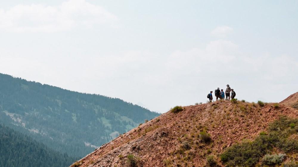 Camp Davis hike trail with 5 hikers on it. 