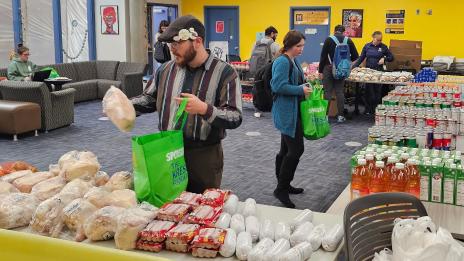 Pantry items and clothes in Wolverine Essentials