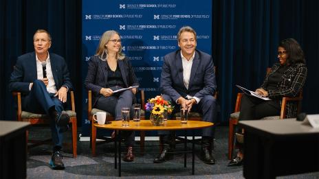 John Kasich, 69th Governer of Ohio, and Steve Bullock, 24th Governor of Montana, sit for a panel discussion with Ford School leaders Jenna Bednar and Celeste Watkins-Hayes.