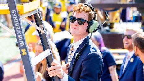 Graduate Student Instructor helping on a game day in the Big House