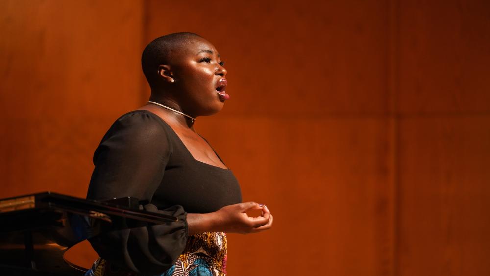 A female student sings during the George Shirley Vocal Competition 