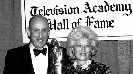 John and Patricia Mitchell accepting a cinematic arts award.