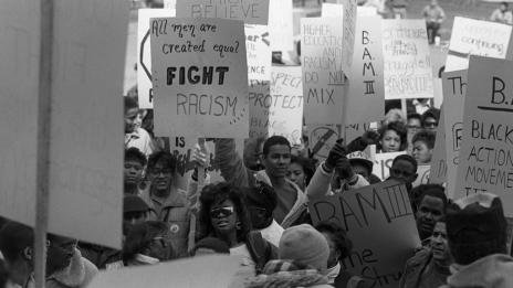 Protesters fighting against racism.