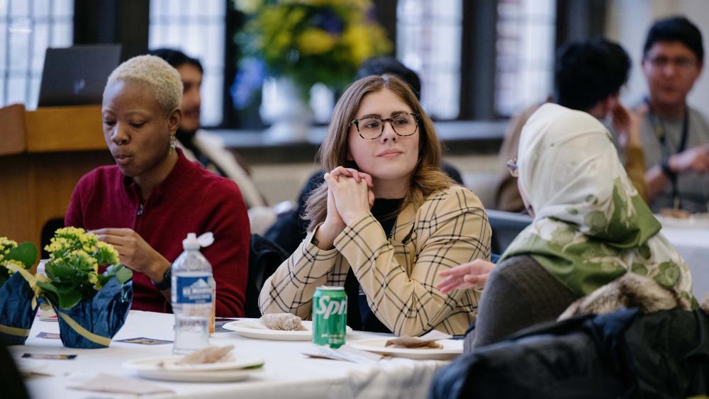 Two students listening at the U-M education campus visit day
