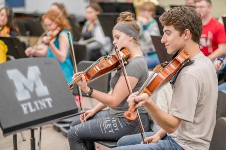 Students playing violin