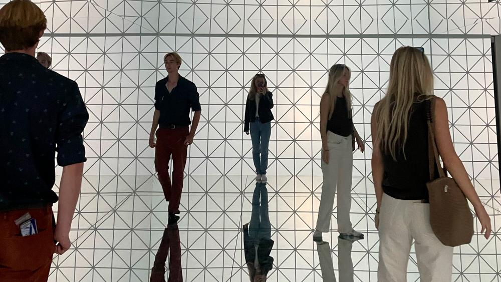 Stamps students in a mirror room in Denmark
