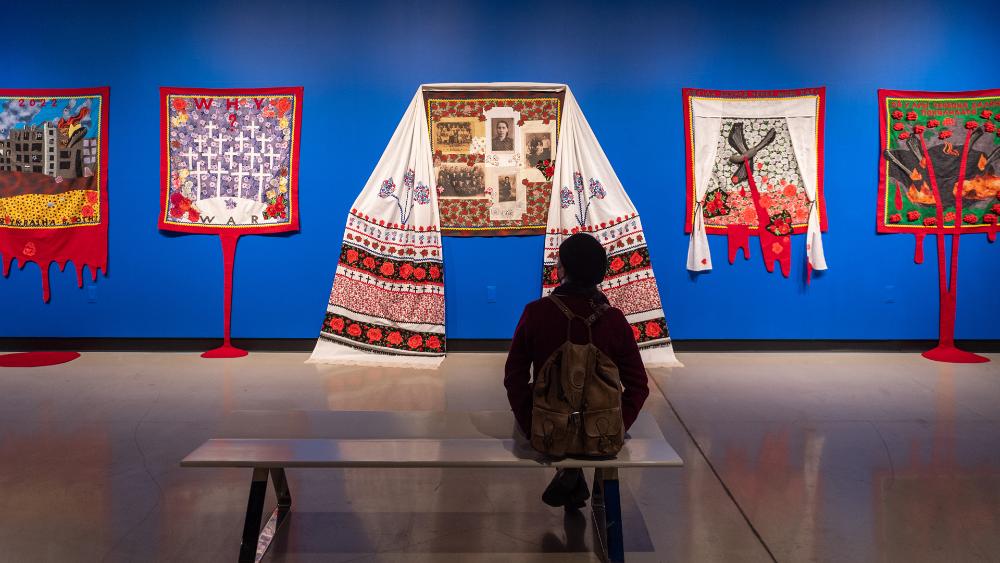 Student views exhibition at Stamps Gallery