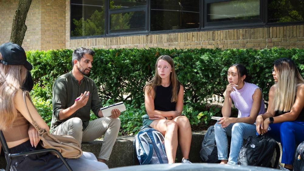 Taubman College students attend class session in the Courtyard