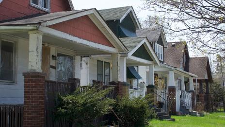 A row of houses in disrepair.