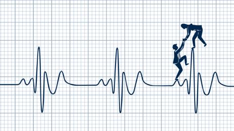 A graphic that depicts two people standing on the line of an EKG chart. One person is reaching down to help the other one up.