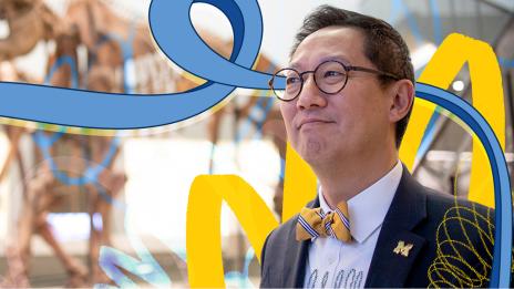 A photo of U-M President Ono smiling with illustrations conveying motion, excitement, maize and blue, energy.