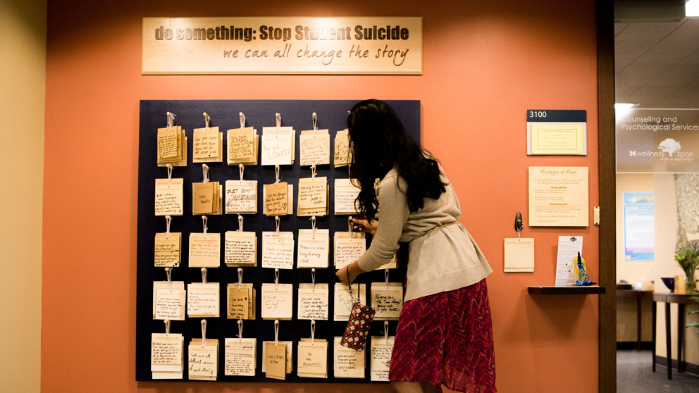 A stop student suicide poster with student notes on it 