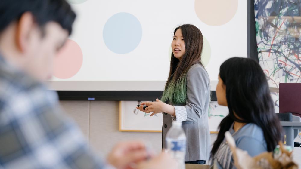 Tiffany Wu, PhD student, lectures a class.