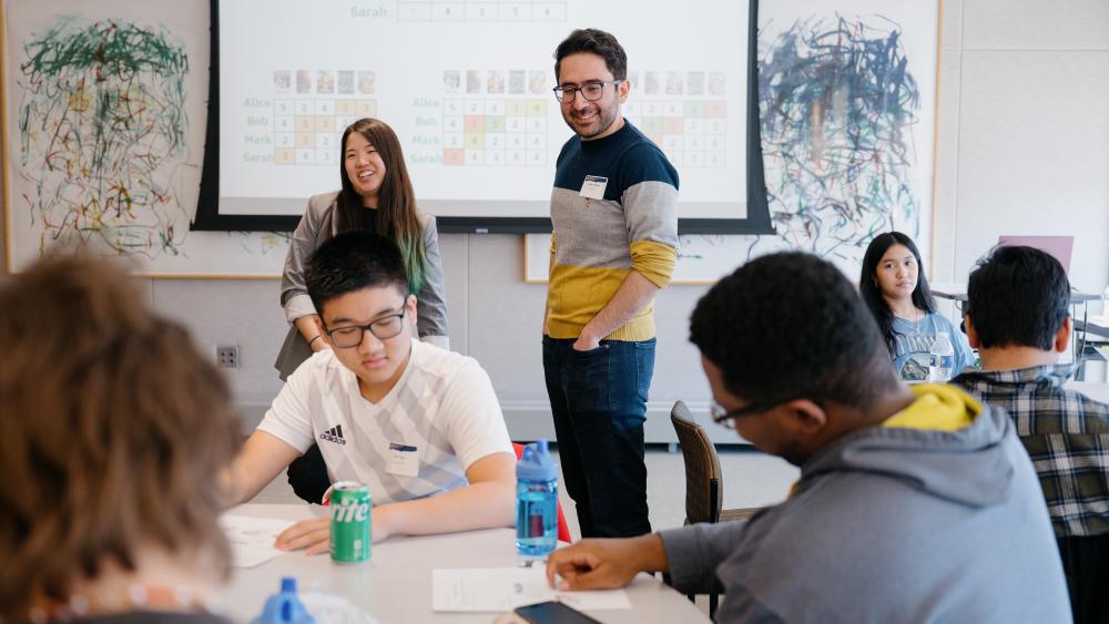 Professor Raed Al Kontar leads a classroom activity with the help of Tiffany Wu, U-M SOE PhD student.