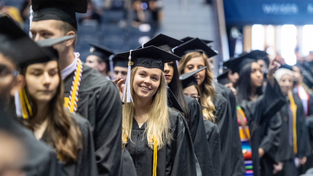 Students in a line at commencement