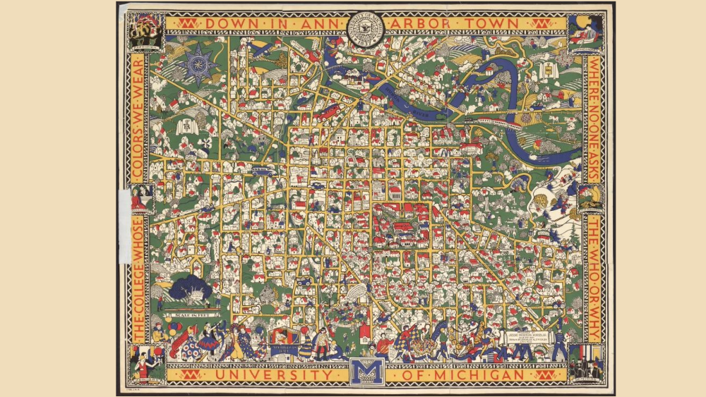  colorful map that shows drawings of homes, streets, and people around the center of the city of Ann Arbor 
