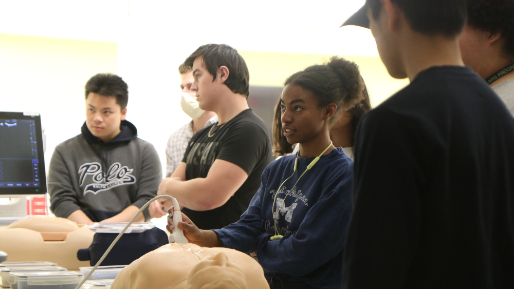 Health Sciences Scholars gather in classroom