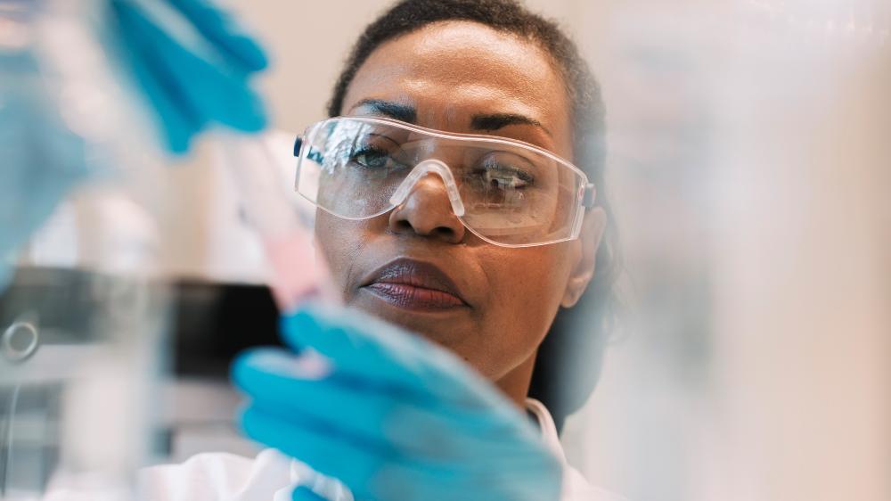 Up close of a female medical professional working in a laboratory