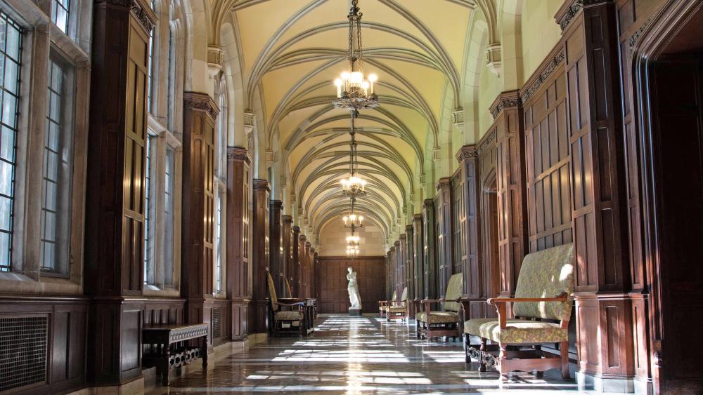 The main hallway of the Martha Cook Building in the sunlight 