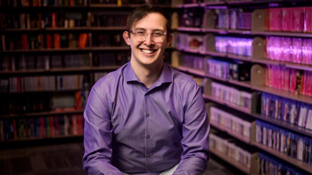University of Michigan School of Information MSI student Clayton Zimmerman in the Computer and Video Game Archive.