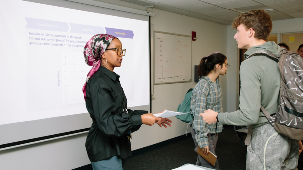 Student and teacher going over course material