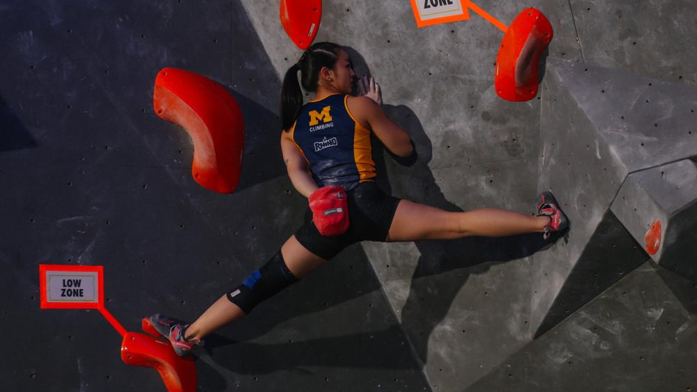 A U-M climber on a rock wall