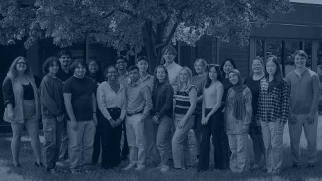 The 2024 D-SIP Cohort stands in front of Wolverine Tower.